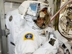 In this photo provided by NASA, astronaut Sunita Williams tries on and evaluates her spacesuit aboard the International Space Station. In this photo provided by NASA, astronaut Sunita Williams tries on and evaluates her spacesuit aboard the International Space Station.