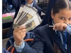 The teacher explained how banks earn money through interest rates. The teacher explained how banks earn money through interest rates.