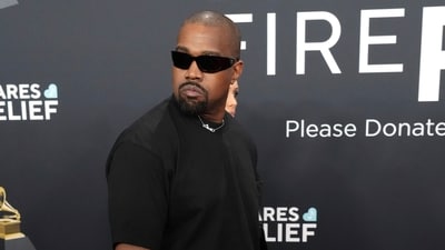 Kanye West's Super Bowl ad promoting Yeezy apparel took a controversial turn when he replaced items with a T-shirt featuring a swastika and the legal expert believes he may avoid consequences. (Jordan Strauss/Invision/AP) Kanye West's Super Bowl ad promoting Yeezy apparel took a controversial turn when he replaced items with a T-shirt featuring a swastika and the legal expert believes he may avoid consequences. (Jordan Strauss/Invision/AP)