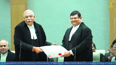 Justice Tejas Karia (right), with Delhi high court chief justice Devendra Kumar Upadhyaya on Friday. (HT Photo)