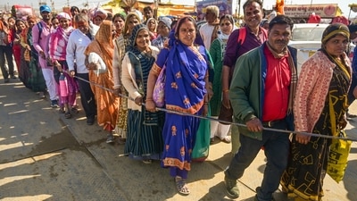 Devotees during the ongoing Maha Kumbh Mela, in Prayagraj, Uttar Pradesh, on Friday. (PTI) Devotees during the ongoing Maha Kumbh Mela, in Prayagraj, Uttar Pradesh, on Friday. (PTI)