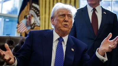 US President Donald Trump speaks during an executive order signing in the Oval Office of the White House in Washington, DC, US, on Friday, Feb. 14, 2025. (Bloomberg) US President Donald Trump speaks during an executive order signing in the Oval Office of the White House in Washington, DC, US, on Friday, Feb. 14, 2025. (Bloomberg)