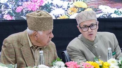 Chief minister Omar Abdullah with J&K National Conference president Farooq Abdullah at a conference in Jammu on Friday. (ANI Photo) Chief minister Omar Abdullah with J&K National Conference president Farooq Abdullah at a conference in Jammu on Friday. (ANI Photo)