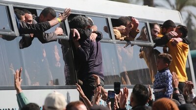 &nbsp;As part of the sixth hostage-prisoner exchange, freed Palestinian prisoners are welcomed by friends and relatives upon arriving at the European Hospital in Khan Yunis in the southern Gaza Strip on February 15, 2025. (Photo by BASHAR TALEB / AFP) (AFP)