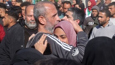 A former Palestinian prisoner, released as part of the sixth hostage-prisoner exchange, is welcomed by a relative upon arriving at the European Hospital in Khan Yunis in the southern Gaza Strip on February 15, 2025. The Israeli Prison Service on February 15 confirmed it had freed 369 prisoners from the Ofer and Kziot prisons near Ramallah and Gaza respectively, after transferring them "from several prisons across the country". (Photo by Eyad BABA / AFP) (AFP)