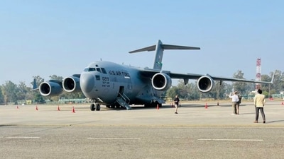 A US military aircraft carrying illegal Indian immigrants upon its landing at the Shri Guru Ramdas Ji International Airport, in Amritsar, Punjab, on February 5, 2025. (PTI) A US military aircraft carrying illegal Indian immigrants upon its landing at the Shri Guru Ramdas Ji International Airport, in Amritsar, Punjab, on February 5, 2025. (PTI)
