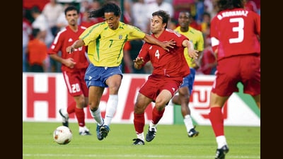Ronaldinho (second from left) of Brazil dribbles past Turkey players at the 2003 FIFA Confedera-tions Cup in France. (Getty Images) Ronaldinho (second from left) of Brazil dribbles past Turkey players at the 2003 FIFA Confedera-tions Cup in France. (Getty Images)