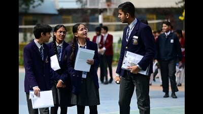 Students coming out after taking the CBSE Class 10 and 12 examination at a Lucknow school on Saturday (HT Photo)