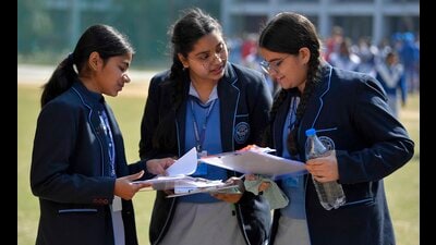 Students discuss question paper outside an examination centre in Ludhiana on Saturday. (HT Photo) Students discuss question paper outside an examination centre in Ludhiana on Saturday. (HT Photo)