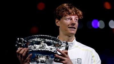 Italy's Jannik Sinner celebrates after defeating Germany's Alexander Zverev during their men's singles final match on day fifteen of the Australian Open (AFP) Italy's Jannik Sinner celebrates after defeating Germany's Alexander Zverev during their men's singles final match on day fifteen of the Australian Open (AFP)