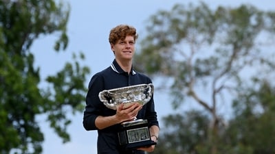 Jannik Sinner in a photoshoot with the Australian Open men's singles trophy. (REUTERS)