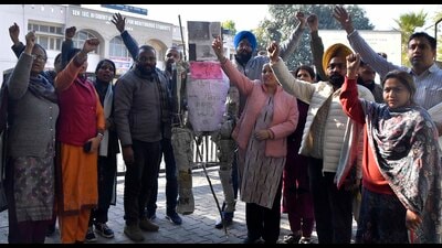 Teachers protesting outside the Senior Secondary Schools for Meritorious Students in Ludhiana on Saturday. (HT Photo) Teachers protesting outside the Senior Secondary Schools for Meritorious Students in Ludhiana on Saturday. (HT Photo)
