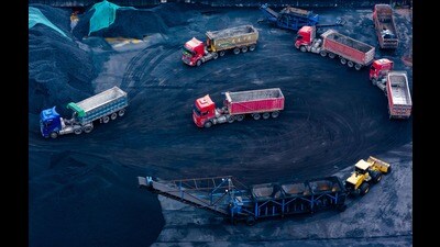 Trucks wait to be loaded with coal, to be taken to a coal-fired power plant, at a coal storage facility in Chongqing, in southwest China on February 12, 2025. (Photo by AFP) / China OUT (AFP) Trucks wait to be loaded with coal, to be taken to a coal-fired power plant, at a coal storage facility in Chongqing, in southwest China on February 12, 2025. (Photo by AFP) / China OUT (AFP)