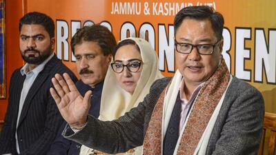 Union minister Kiren Rijiju with chairperson of the Jammu and Kashmir Waqf Board Darakhshan Anrabrai, third from left, during a press conference in Srinagar on Saturday. (PTI Photo) Union minister Kiren Rijiju with chairperson of the Jammu and Kashmir Waqf Board Darakhshan Anrabrai, third from left, during a press conference in Srinagar on Saturday. (PTI Photo)