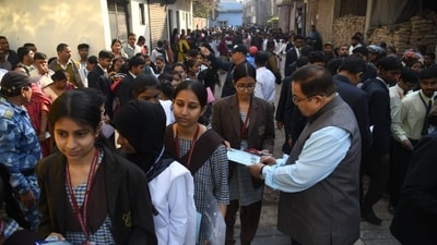 Students showing there admit card outside St. Dominic Savio's High School Danapur in Patna before appearing for CBSE 10th board examination. (Santosh Kumar ) Students showing there admit card outside St. Dominic Savio's High School Danapur in Patna before appearing for CBSE 10th board examination. (Santosh Kumar )