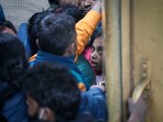 At least 18 people were killed and more than a dozen injured in a stampede that broke out late Saturday night at the crowded New Delhi railway station.