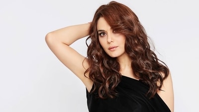 In 2023, for a photoshoot with celebrity photographer Dabboo Ratnani, Preity Zinta opted for elegant black dress that exudes confidence and sophistication. (Instagram/ Preity Zinta) In 2023, for a photoshoot with celebrity photographer Dabboo Ratnani, Preity Zinta opted for elegant black dress that exudes confidence and sophistication. (Instagram/ Preity Zinta)