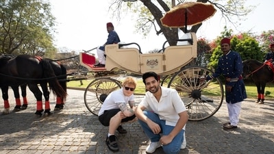 Ed Sheeran took a head massage as he sat outdoors. He also met and posed with Armaan Malik. Ed Sheeran took a head massage as he sat outdoors. He also met and posed with Armaan Malik. 