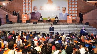 BJP supporters listen to Prime Minister Narendra Modi during celebrations of the party's victory in the Delhi Assembly poll, at the BJP HQ in New Delhi on Februay 8. (PTI file) BJP supporters listen to Prime Minister Narendra Modi during celebrations of the party's victory in the Delhi Assembly poll, at the BJP HQ in New Delhi on Februay 8. (PTI file)