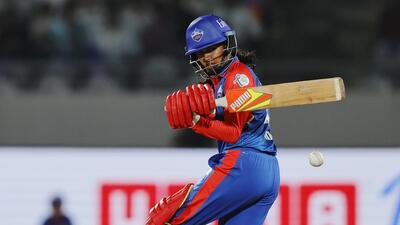 Niki Prasad of Delhi Capitals batting during their match against Mumbai Indians in Vadodara.
