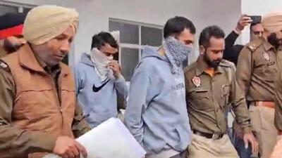 One of the accused being taken into police custody right after landing from the US. (HT File) One of the accused being taken into police custody right after landing from the US. (HT File)