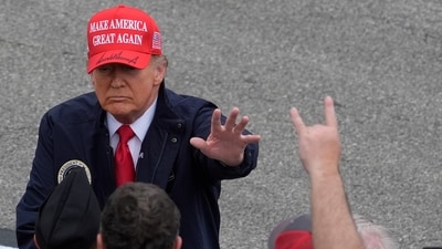 President Donald Trump greets attendees at the NASCAR Daytona 500 auto race at Daytona International Speedway, Sunday, Feb. 16, 2025, in Daytona Beach, Fla. (AP Photo/Chris O'Meara) (AP) President Donald Trump greets attendees at the NASCAR Daytona 500 auto race at Daytona International Speedway, Sunday, Feb. 16, 2025, in Daytona Beach, Fla. (AP Photo/Chris O'Meara) (AP)