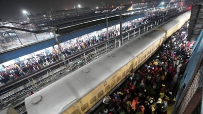 Heavy passenger rush at New Delhi Railway Station on Saturday as devotees attempted to board trains for the Maha Kumbh. (PTI) Heavy passenger rush at New Delhi Railway Station on Saturday as devotees attempted to board trains for the Maha Kumbh. (PTI)