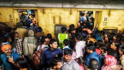 The death toll from the New Delhi Railway Station stampede rose to 18 on Sunday. A senior railway official stated that the chaos began when some passengers slipped while descending from a foot-over bridge, leading to others falling over them. (AP) The death toll from the New Delhi Railway Station stampede rose to 18 on Sunday. A senior railway official stated that the chaos began when some passengers slipped while descending from a foot-over bridge, leading to others falling over them. (AP)