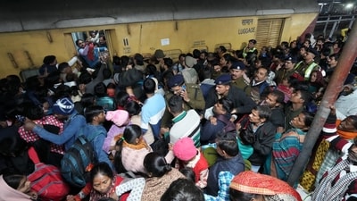 In an official statement, the deputy commissioner of police (railways) said platform 14 was already overcrowded when the Prayagraj Express was stationed there for departure. The situation worsened as Swatantra Senani Express and Bhubaneswar Rajdhani Express were delayed, adding to the crowd on platforms 12, 13, and 14. (PTI) In an official statement, the deputy commissioner of police (railways) said platform 14 was already overcrowded when the Prayagraj Express was stationed there for departure. The situation worsened as Swatantra Senani Express and Bhubaneswar Rajdhani Express were delayed, adding to the crowd on platforms 12, 13, and 14. (PTI)