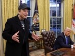 Elon Musk speaks next to US President Donald Trump in the Oval Office of the White House in Washington, DC