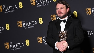 Brady Corbet poses with the award for Best Director for The Brutalist during the BAFTA British Academy Film Awards ceremony in London. (AFP) Brady Corbet poses with the award for Best Director for The Brutalist during the BAFTA British Academy Film Awards ceremony in London. (AFP)
