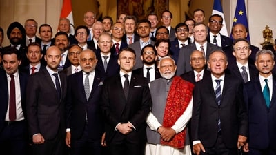 French President Emmanuel Macron (C-L) and Indian Prime Minister Narendra Modi (C-R) pose for a family picture before the closing session of the Franco-Indian Economic Forum at the Quai d'Orsay following the Artificial Intelligence (AI) Action Summit in Paris, on February 11, 2025. (Photo by Abdul Saboor / POOL / AFP) (AFP) French President Emmanuel Macron (C-L) and Indian Prime Minister Narendra Modi (C-R) pose for a family picture before the closing session of the Franco-Indian Economic Forum at the Quai d'Orsay following the Artificial Intelligence (AI) Action Summit in Paris, on February 11, 2025. (Photo by Abdul Saboor / POOL / AFP) (AFP)