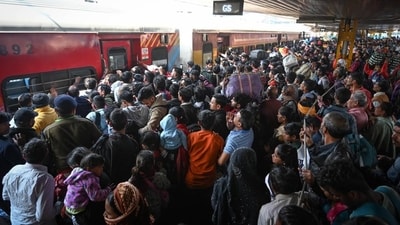 Even after 18 people were killed in the stampede at the New Delhi Railway Station amid the Maha Kumbh crowd on Sunday, passengers continued to board trains to Prayagraj at the station. (Sanchit Khanna/HT Photo) Even after 18 people were killed in the stampede at the New Delhi Railway Station amid the Maha Kumbh crowd on Sunday, passengers continued to board trains to Prayagraj at the station. (Sanchit Khanna/HT Photo)