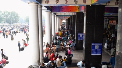 A view of New Delhi Railway Station as passengers wait with their luggage, in New Delhi on Monday. A stampede on 15th Feb left 18 people dead and several others injured. (Ishant ) A view of New Delhi Railway Station as passengers wait with their luggage, in New Delhi on Monday. A stampede on 15th Feb left 18 people dead and several others injured. (Ishant )