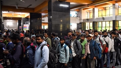Passengers wait in queues with their luggage at New Delhi Railway Station, in New Delhi on Monday. (Ishant ) Passengers wait in queues with their luggage at New Delhi Railway Station, in New Delhi on Monday. (Ishant )