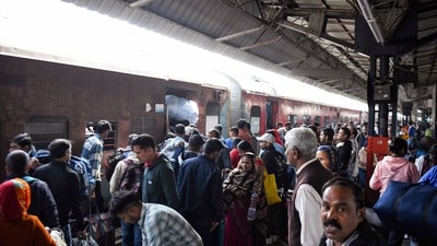  Passengers gather at New Delhi Railway Station to board a train, in New Delhi on Monday. (ANI Photo/Ishant) (Ishant ) Passengers gather at New Delhi Railway Station to board a train, in New Delhi on Monday. (ANI Photo/Ishant) (Ishant )