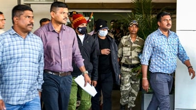 Immigrants deported from the United States of America, being escorted after they arrived at the airport, in Ahmedabad, Monday, Feb. 17, 2025. (PTI) Immigrants deported from the United States of America, being escorted after they arrived at the airport, in Ahmedabad, Monday, Feb. 17, 2025. (PTI)