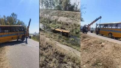 The school bus that fell into the canal and was later brought out with the help of a crane near Noch village of Kaithal district on Monday.