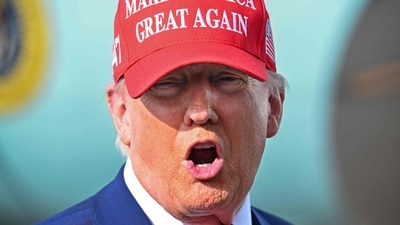 US President Donald Trump speaks to reporters after landing at the Palm Beach International Airport in West Palm Beach, Florida on February 16, 2025 after attending the Daytona 500 car race earlier in the day. (Photo by ROBERTO SCHMIDT / AFP) (AFP)