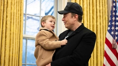 Elon Musk with his four-year-old son X in the Oval Office (AFP) Elon Musk with his four-year-old son X in the Oval Office (AFP)