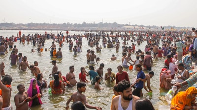 Devotees take a dip at Triveni Sangam during the ongoing 'Maha Kumbh Mela 2025', in Prayagraj. (ANI) Devotees take a dip at Triveni Sangam during the ongoing 'Maha Kumbh Mela 2025', in Prayagraj. (ANI)