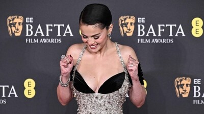 Selena Gomez poses on the red carpet upon arrival at the BAFTA British Academy Film Awards at the Royal Festival Hall, Southbank Centre, in London. Selena Gomez poses on the red carpet upon arrival at the BAFTA British Academy Film Awards at the Royal Festival Hall, Southbank Centre, in London.