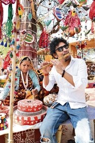 Papon's joy was palpable as he discovered some earthy, traditional musical instruments at the mela. (Photo: Anurag Mehra/HT)