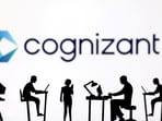 Figurines with computers and smartphones are seen in front of Cognizant logo in this illustration taken, February 19, 2024.