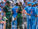 Pakistan's Babar Azam and Mohammad Rizwan wait for the decision of review as Indian players look on during the ICC Men's Cricket World Cup 2023 match between India and Pakistan Pakistan's Babar Azam and Mohammad Rizwan wait for the decision of review as Indian players look on during the ICC Men's Cricket World Cup 2023 match between India and Pakistan