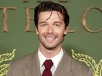 Patrick Schwarzenegger stars as Saxon Ratliff in The White Lotus. Patrick Schwarzenegger stars as Saxon Ratliff in The White Lotus.