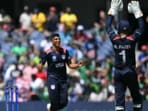 USA cricketers Nosthush Kenjige and Monank Patel celebrate