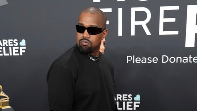 After expressing admiration for Hitler and promoting swastika-themed T-shirts, Kanye West claims to have made $40 million. (Jordan Strauss/Invision/AP) After expressing admiration for Hitler and promoting swastika-themed T-shirts, Kanye West claims to have made $40 million. (Jordan Strauss/Invision/AP)