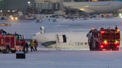 A Delta airlines plane sits on its roof after crashing upon landing at Toronto Pearson Airport in Toronto, Ontario, on February 17, 2025. A Delta Air Lines jet with 80 people onboard crash landed Monday at the Toronto airport, officials said, flipping upside down and leaving at least 15 people injured but causing no fatalities. (AFP) A Delta airlines plane sits on its roof after crashing upon landing at Toronto Pearson Airport in Toronto, Ontario, on February 17, 2025. A Delta Air Lines jet with 80 people onboard crash landed Monday at the Toronto airport, officials said, flipping upside down and leaving at least 15 people injured but causing no fatalities. (AFP)