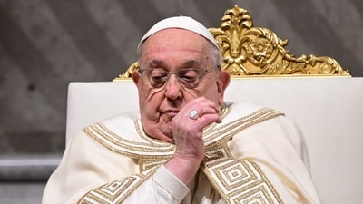 Pope Francis has developed pneumonia in both lungs days after being hospitalised: Report (Photo by Tiziana FABI / AFP) (AFP)